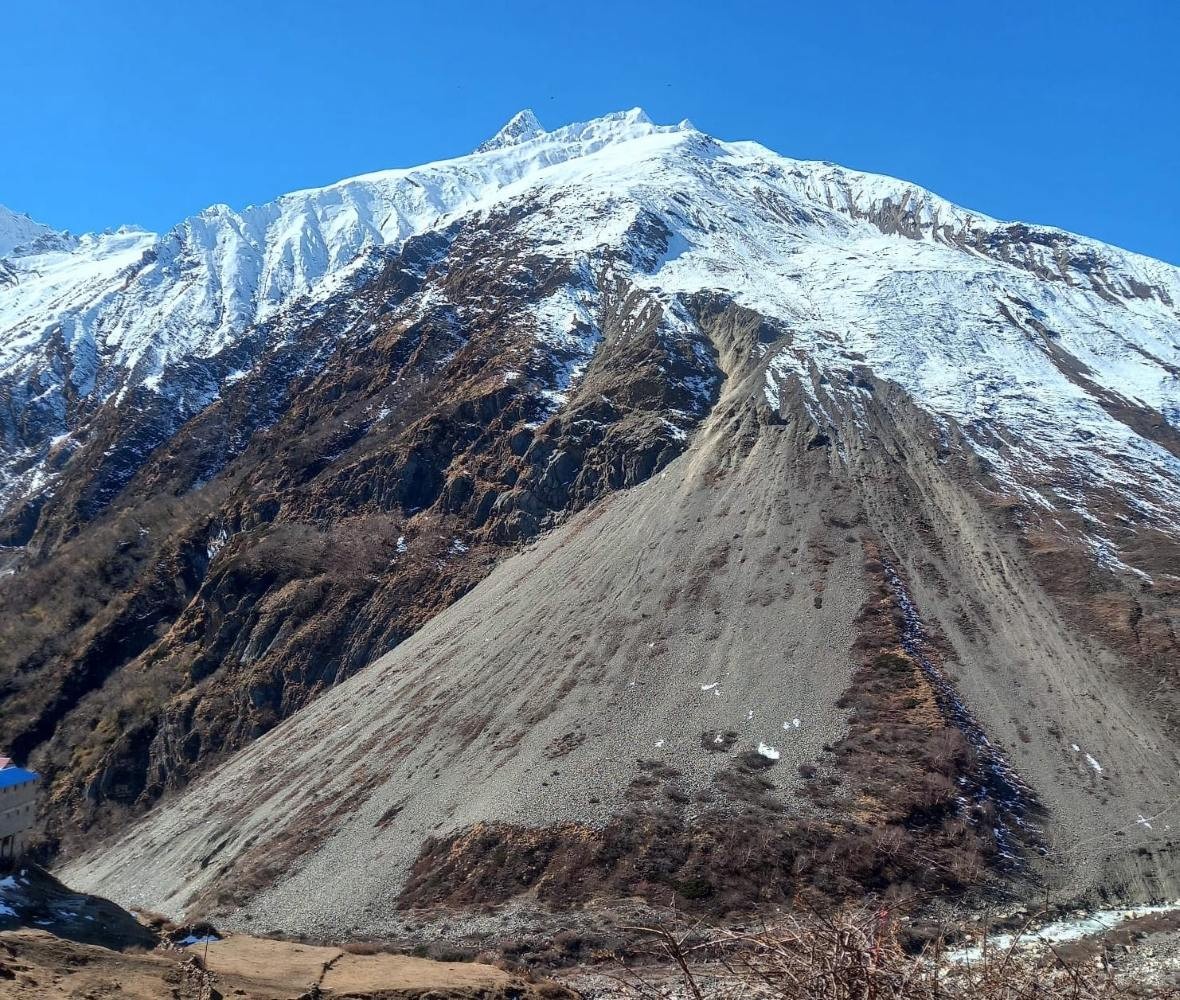 Snow-covered peak along Manaslu trekking route