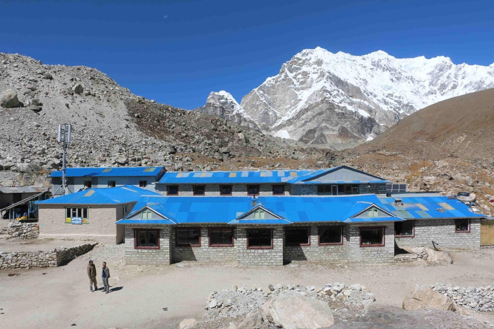 Traditional teahouse lodge on the Everest Base Camp Trek, offering cozy accommodation, mountain hospitality, and stunning views of the surrounding Himalayan landscapeTraditional teahouse lodge on the Everest Base Camp Trek, offering cozy accommodation, mountain hospitality, and stunning views of the surrounding Himalayan landscape