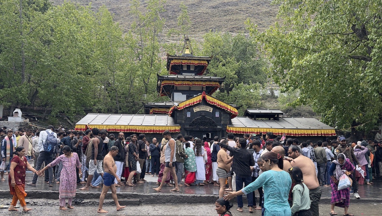 "Muktinath Temple Complex in Mustang, Nepal, featuring the sacred Vishnu temple, 108 water spouts, Buddhist shrines, and Himalayan mountain scenery along the Annapurna Circuit Trek.