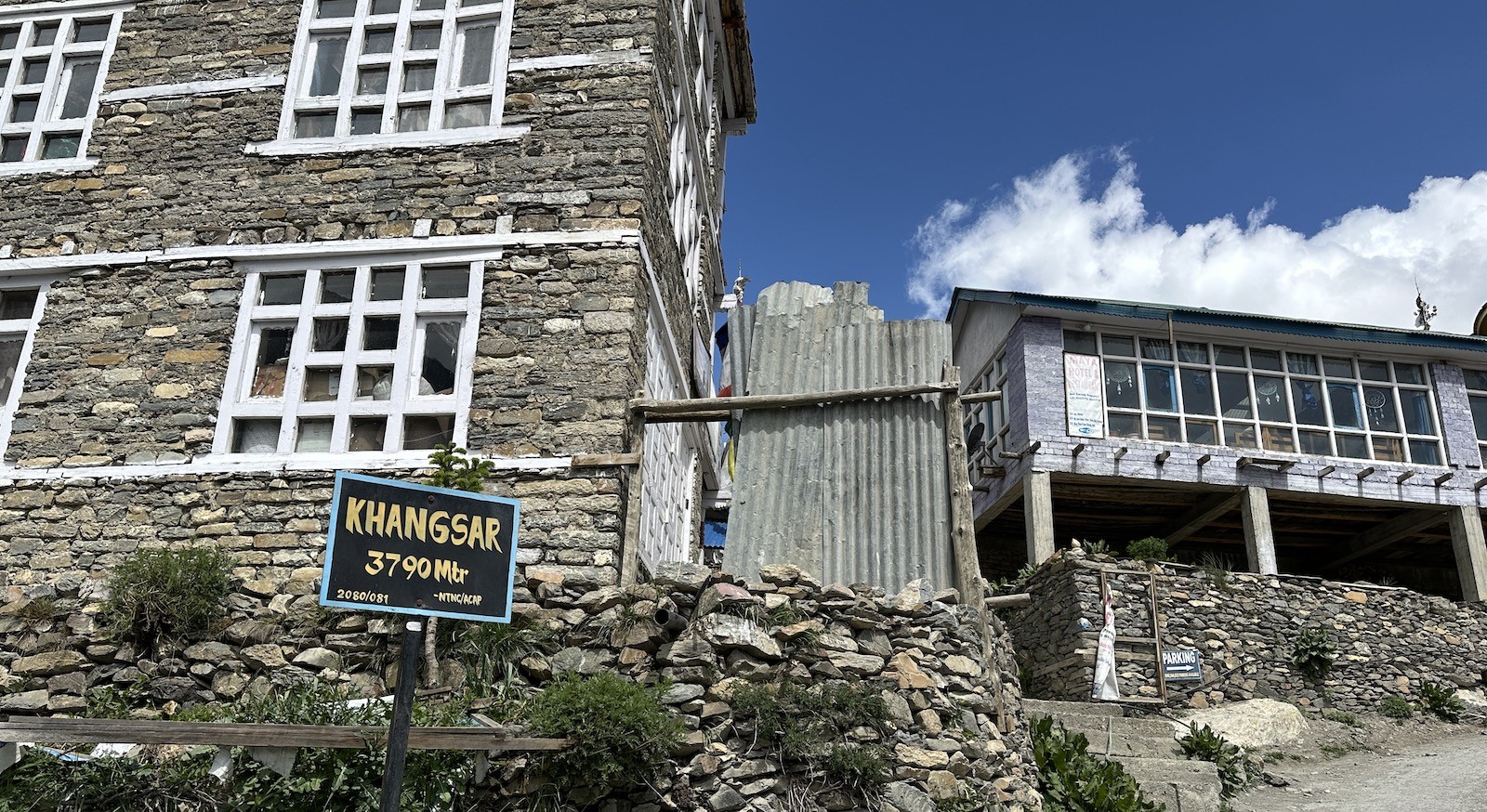 Khangsar Village Annapurna Circuit Trek Nepal featuring traditional mountain houses, rugged trails, and snow-capped Himalayan peaks
