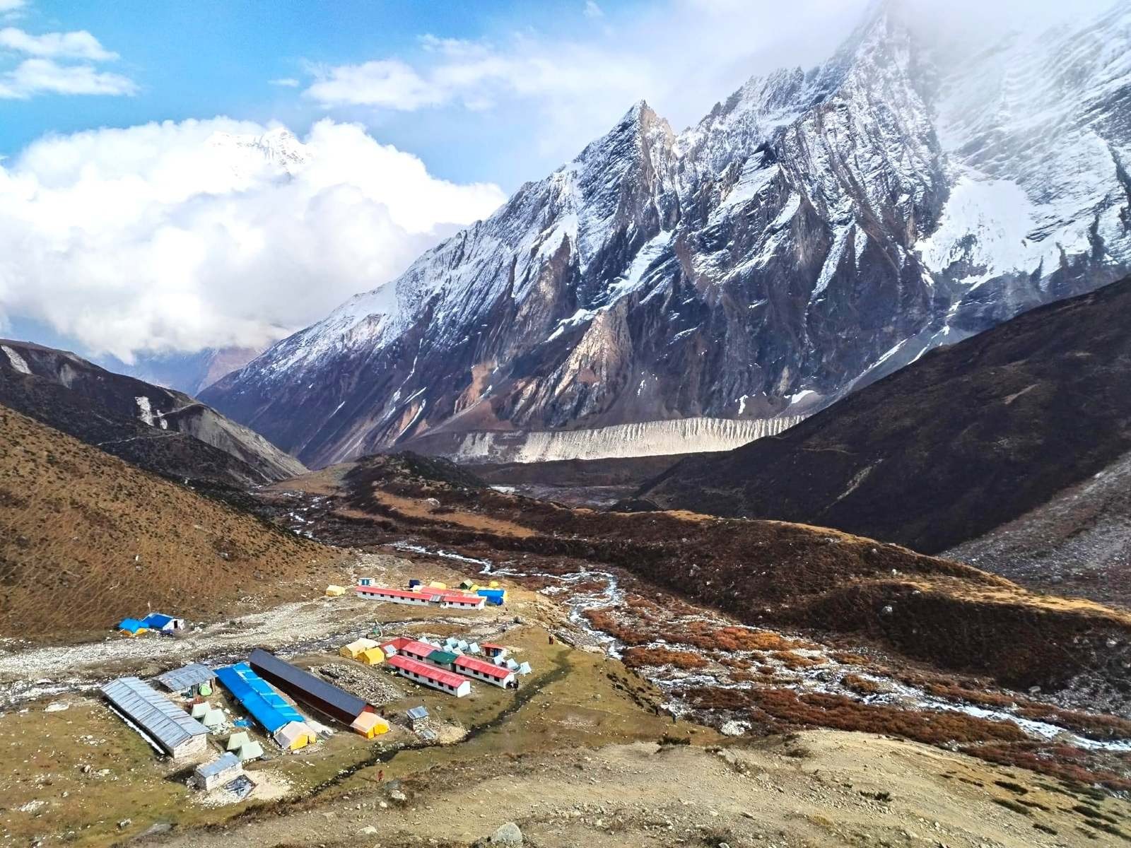 Wide mountain valley seen from Dharmasala with rugged peaks