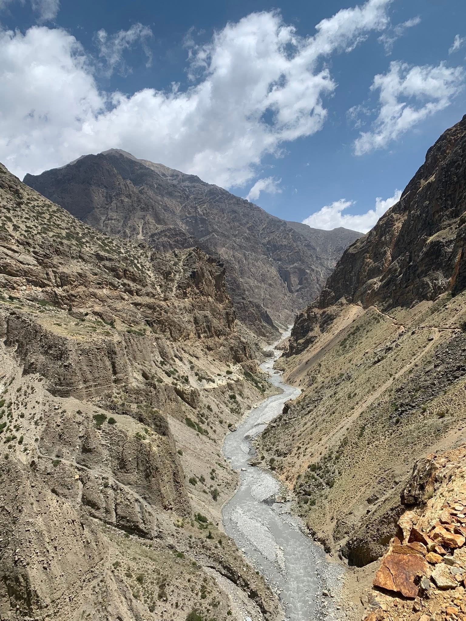 Nar Phu Valley trekking trail in Nepal with remote Himalayan path, rocky terrain and mountain scenery
