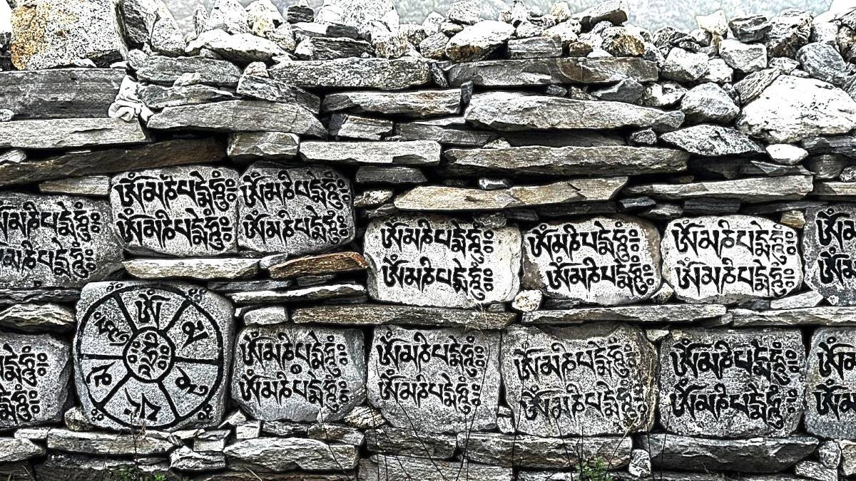 memorials with Tibetan Manatras on Langtang Valley Trekking Trail