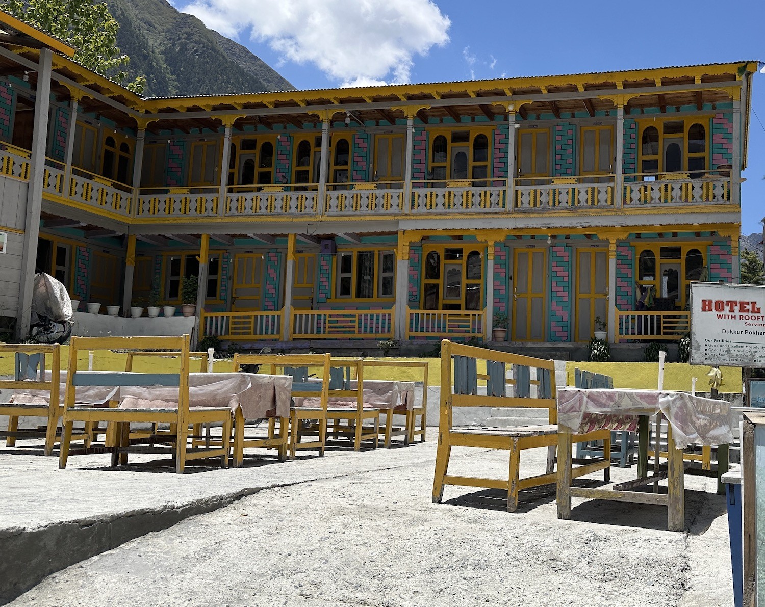 Traditional teahouse accommodation in Pisang Village on the Annapurna Circuit Trek, featuring stone-built lodges with colorful roofs, cozy twin rooms, mountain views, and a peaceful Himalayan setting.