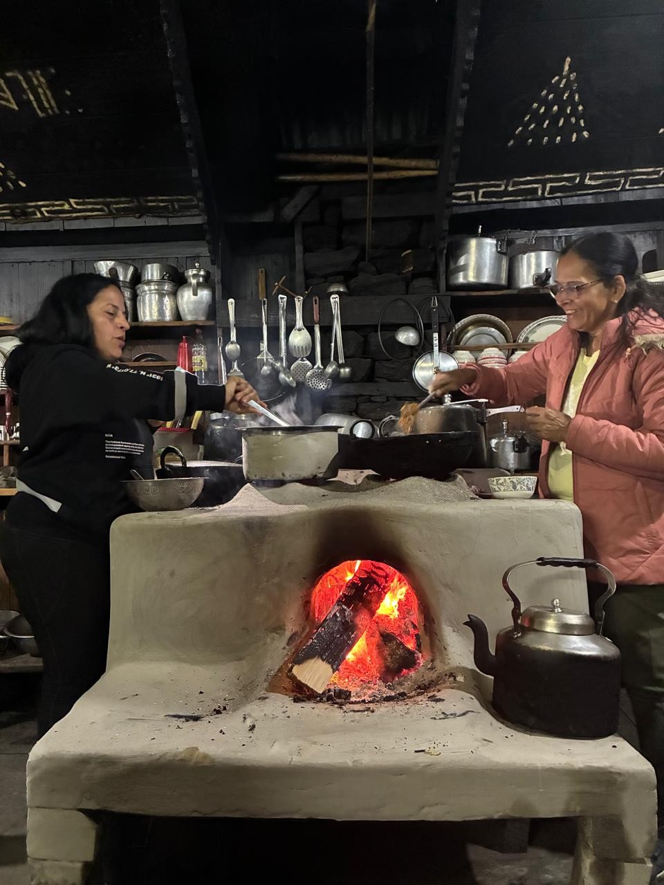cooking in the local kitchen during Langtang Valley Trek