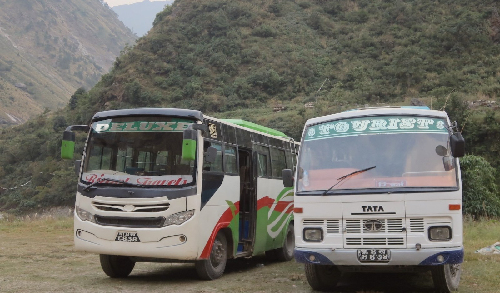 Scenic drive from Kathmandu to Syabrubesi featuring winding mountain highways, Trishuli River, green hills, terraced farmlands, traditional villages, suspension bridges, and breathtaking Himalayan landscapes on the way to the Langtang Valley Trek