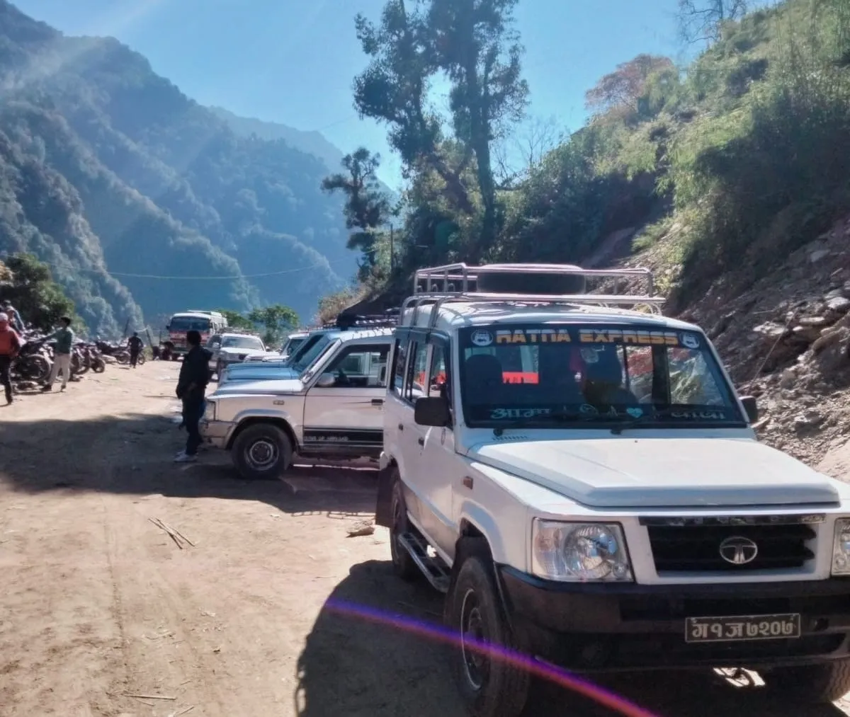 Early morning jeep journey from Pokhara to Jhinu Danda, passing scenic rivers, terraced hillsides, traditional villages, and beautiful Annapurna foothill landscapes at the start of the Annapurna Base Camp Trek.