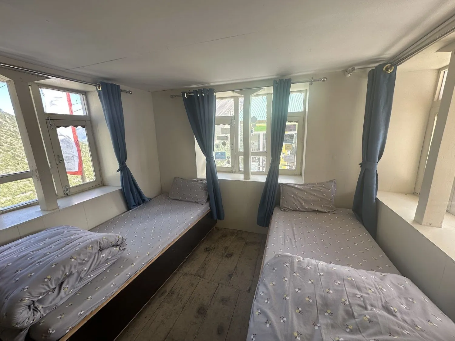 Teahouse rooms and trekking accommodation at Shree Kharka on the Annapurna Circuit Trek, offering comfortable lodging with beautiful Himalayan mountain views.